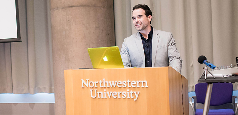 Dario Robleto presents on his research during a previous engagement at Northwestern.