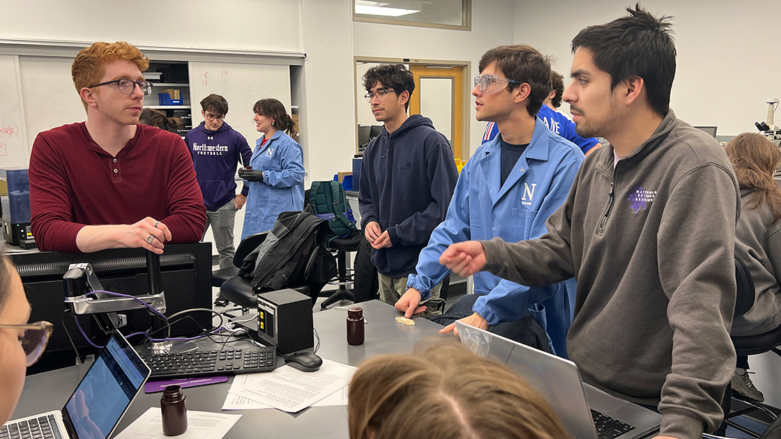 Teaching Assistant Alex Evenchik discusses resin formulation ideas with MSE students Hayden Williams and Bryan Villalpando-Hernandez.
