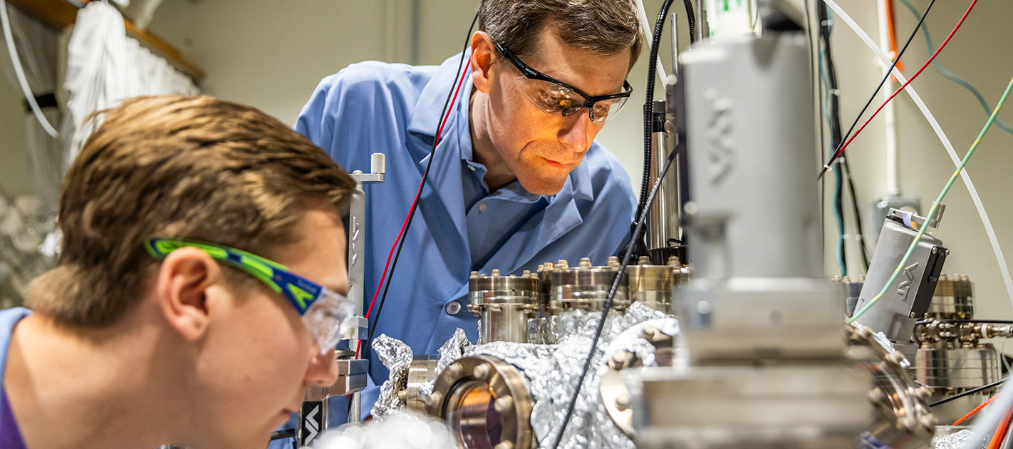 Professor Hersam and colleague working in lab