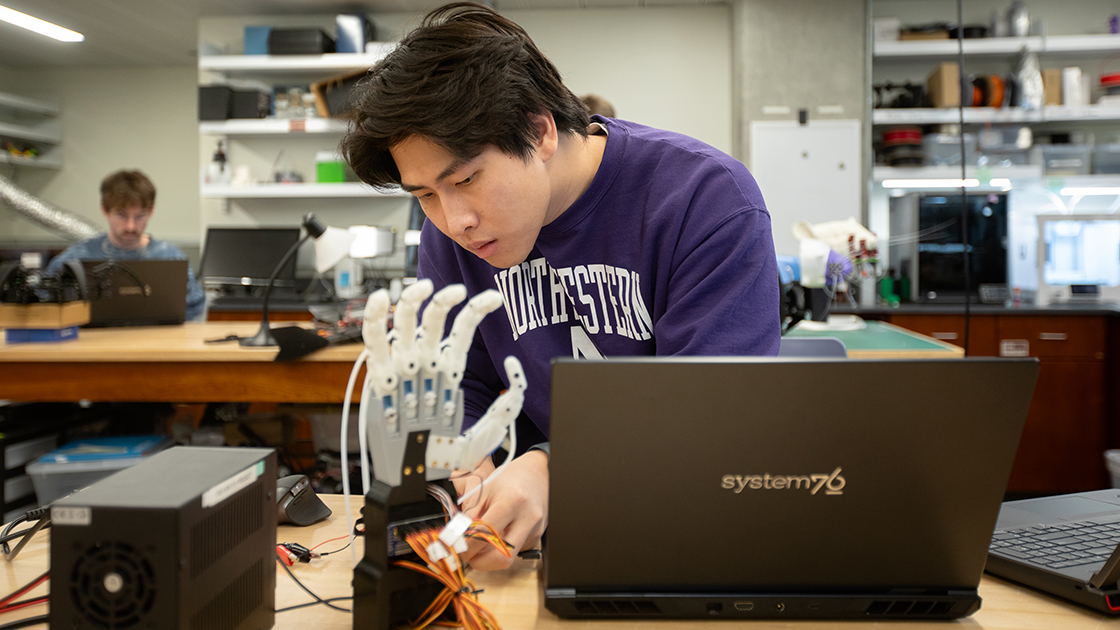 Graduate student Kris Weng works on his project in the CRB’s makerspace.
